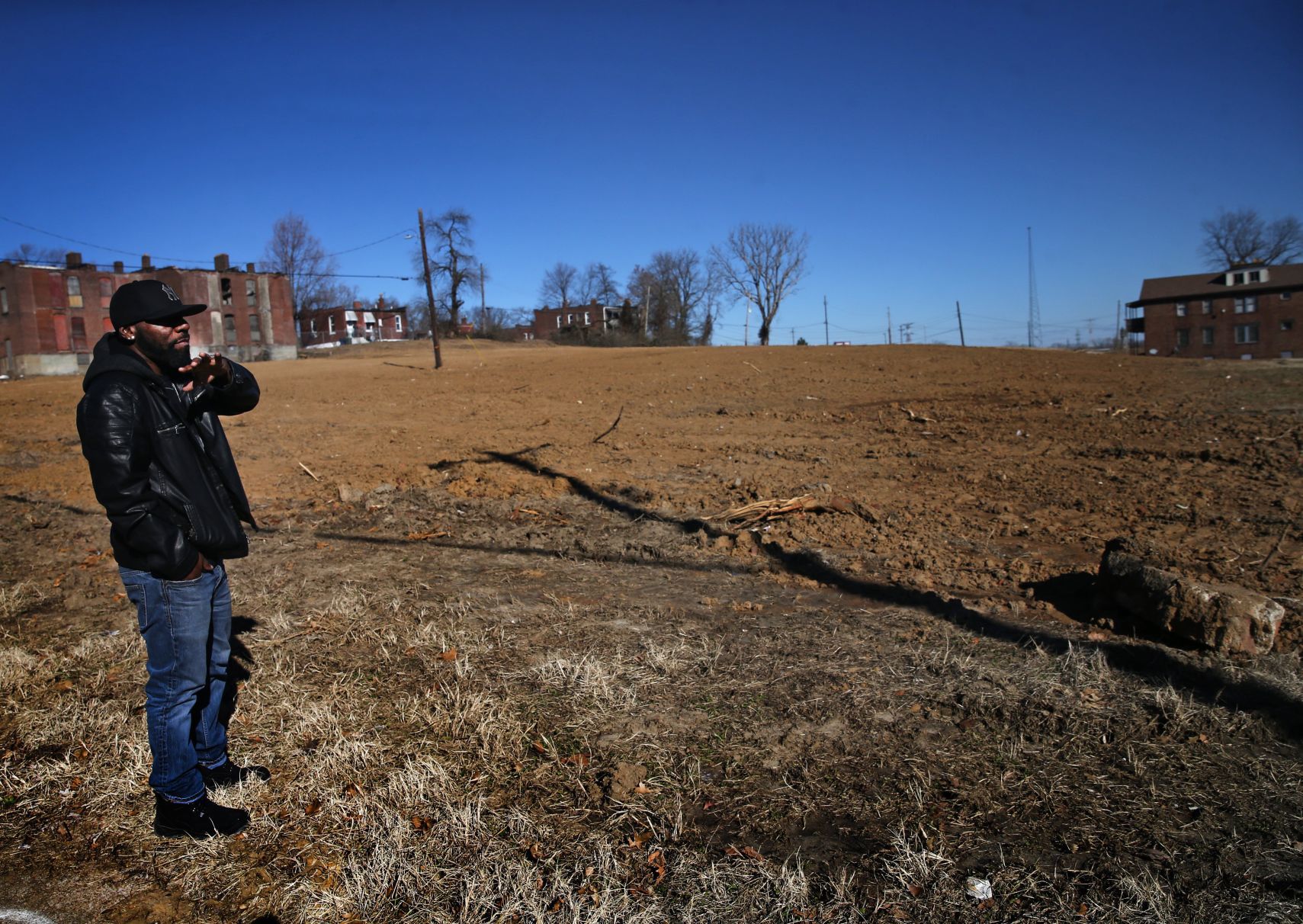 Supervisor Will Young inspects a cleaned-up area